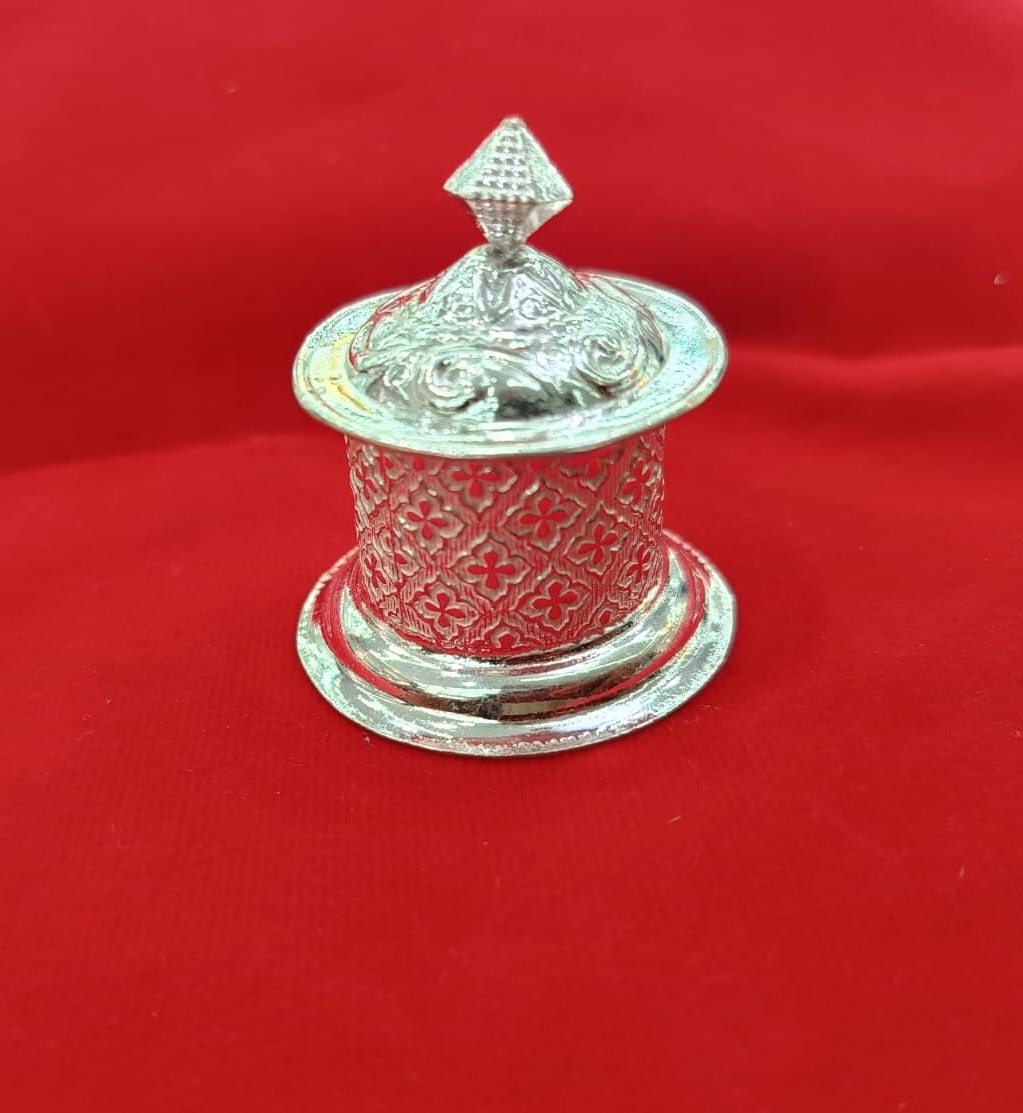 Traditional design silver Kumkum holder, crafted in an antique style for both personal and pooja usage.